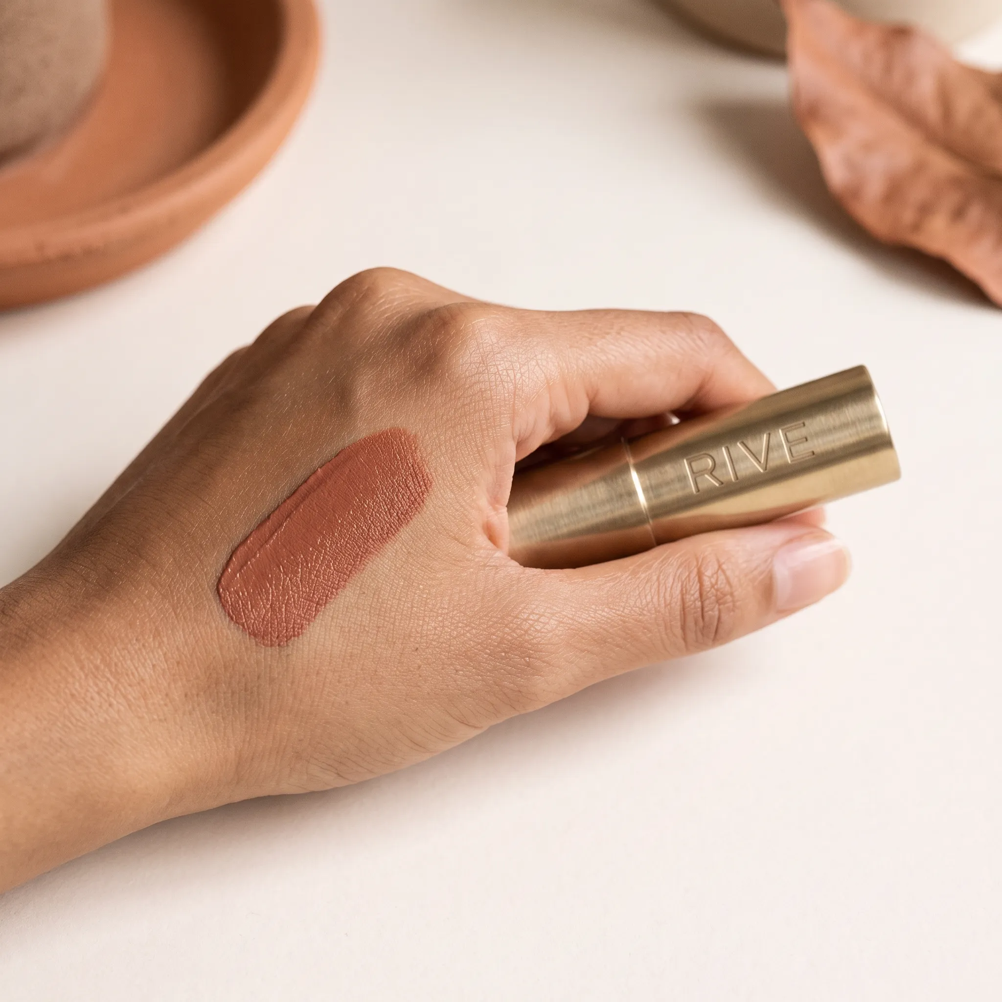 Rive lipstick swatch on skin