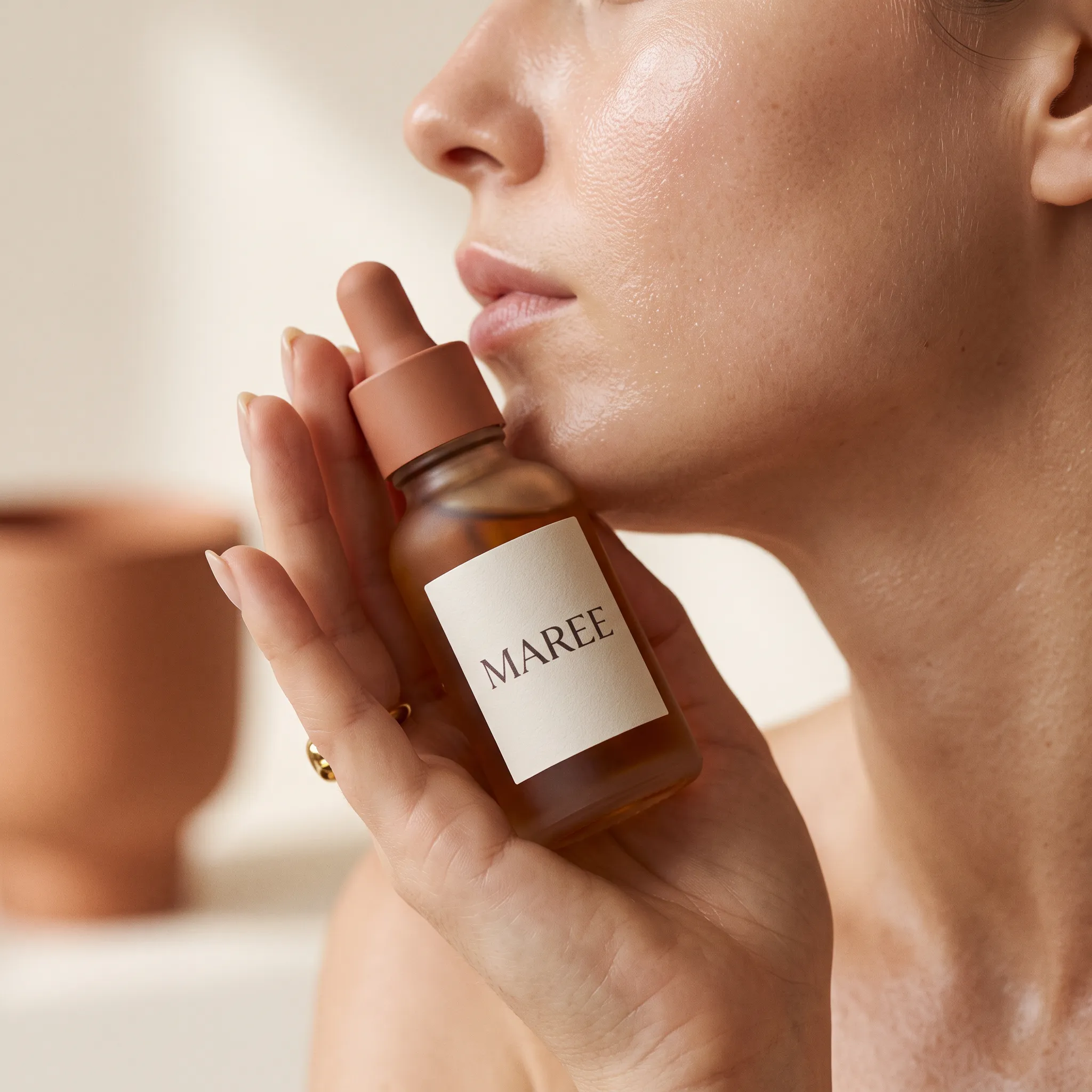 On-skin ad: serum cradled against a cheek